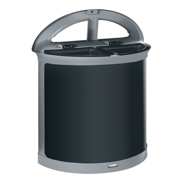 A black and grey Rubbermaid half round dual stream trash can with a lid on top.