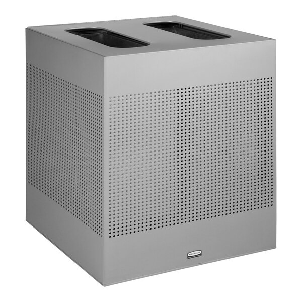 A square gray metal Rubbermaid trash can with holes in it.