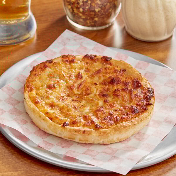 A Tony's Deep Dish cheese pizza on a plate.