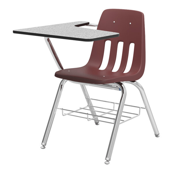 A gray school desk with a wine shell tablet arm.