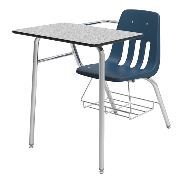 A blue Virco student desk and chair with a book rack.