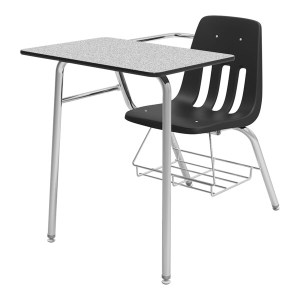 A black Virco student desk with a gray desktop and underseat book rack, paired with a black chair.