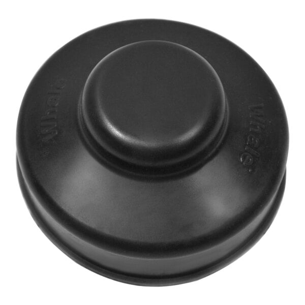 A close-up of a black plastic knob with a round top and a logo on a white background.