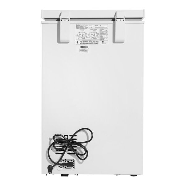 A white rectangular Danby chest freezer with a black cord.