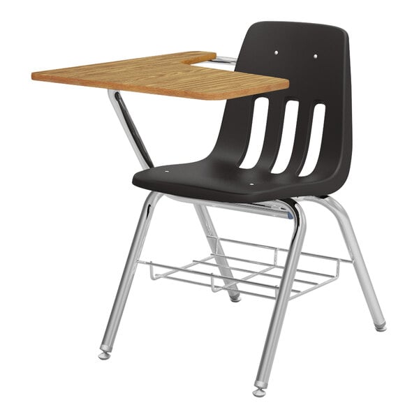 A black Virco student desk chair with a medium oak tablet arm.