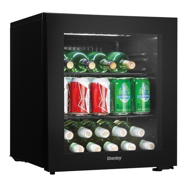 A black Danby countertop wine cooler with a glass door, displaying bottles and cans inside.