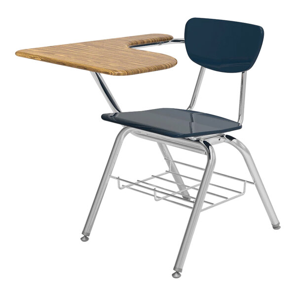 A medium oak Virco student desk with a navy seat and tablet arm.