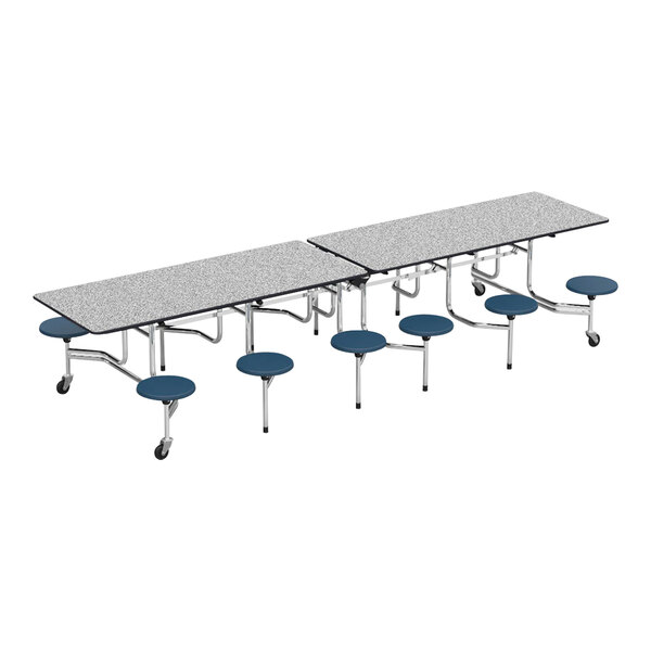 Two MTS mobile cafeteria tables with navy stools on them.