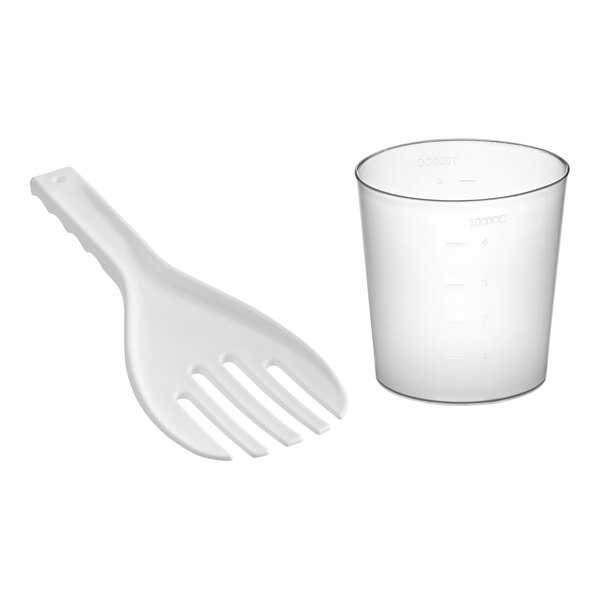 A clear plastic measuring cup with a black handle.