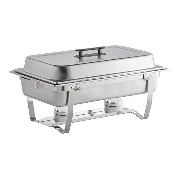 A close-up of a stainless steel Choice Economy rectangular chafer with a lid on a table.