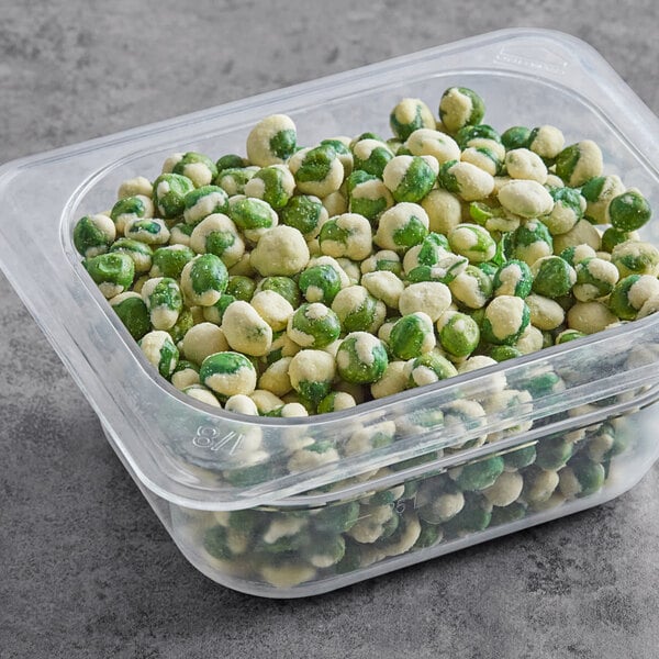 A plastic container of Green Wasabi Peas.