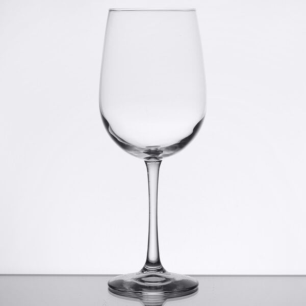 A clear Libbey Vina tall wine glass on a white background.