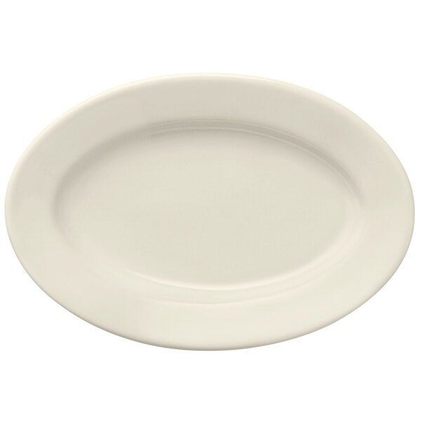 A Libbey white porcelain oval platter with a wide rim.