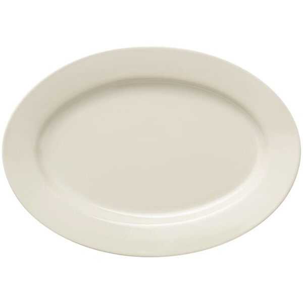 A Libbey Porcelana white oval platter with a wide rim.