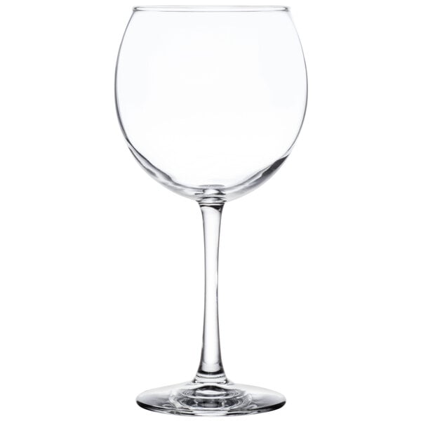 A close-up of a clear Libbey Vina wine glass with a stem.