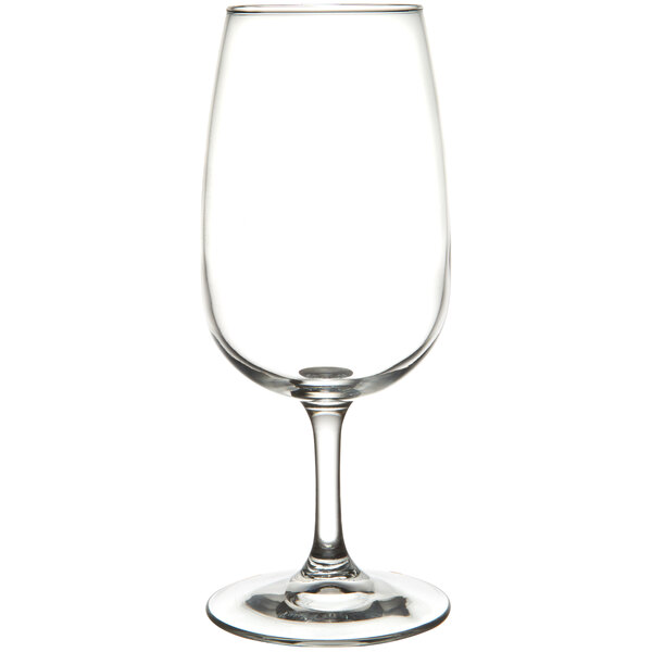 A close-up of a clear Libbey Vina wine glass with a stem.