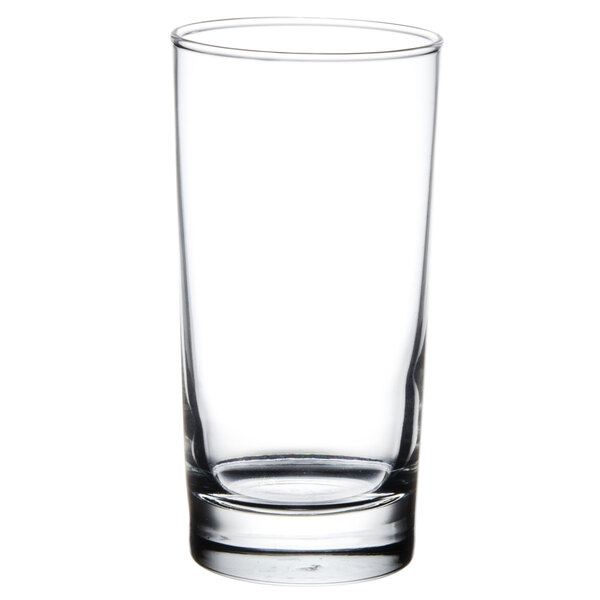A close-up of a Libbey clear beverage glass with a heavy base.