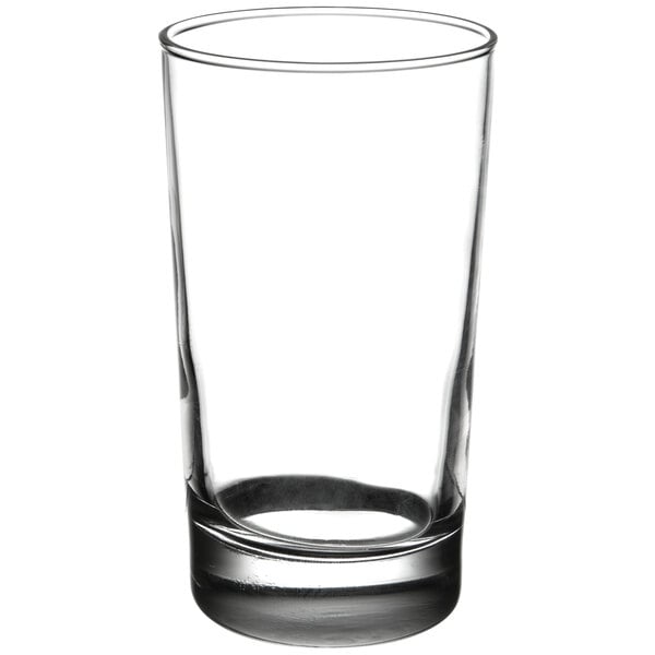 A Libbey clear highball glass with a white background.