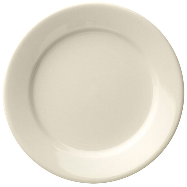 A Libbey Porcelana white porcelain plate with a wide rim.