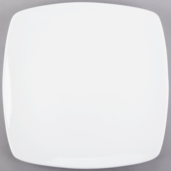 A Libbey Porcelana white square porcelain coupe plate with a white rim.