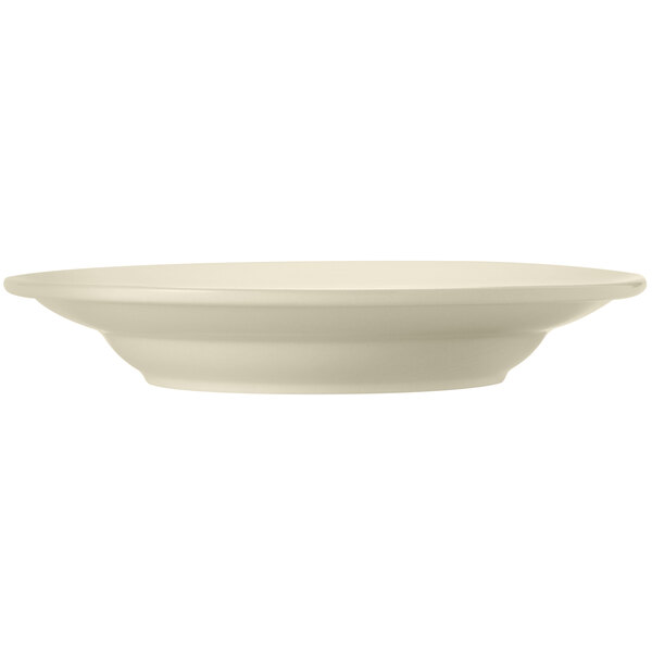 A Libbey Porcelana white porcelain pasta bowl with a white border.