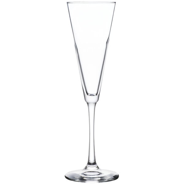 A clear Libbey trumpet flute glass with a long stem.