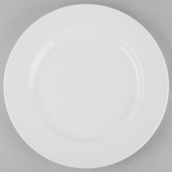 A Libbey Porcelana white porcelain plate with a white rim.