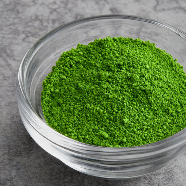 A bowl of Chefmaster green dry powder food color.