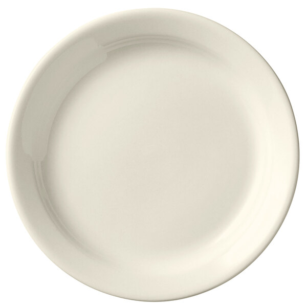 A Libbey Porcelana narrow rim cream white porcelain plate.