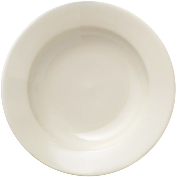 A Libbey Porcelana Cream white pasta bowl with a wide rim.