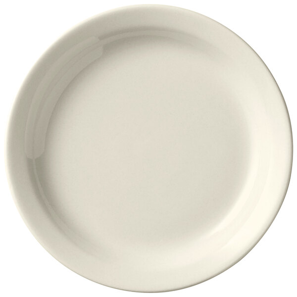 A close-up of a Libbey Porcelana Cream white plate with a plain edge.