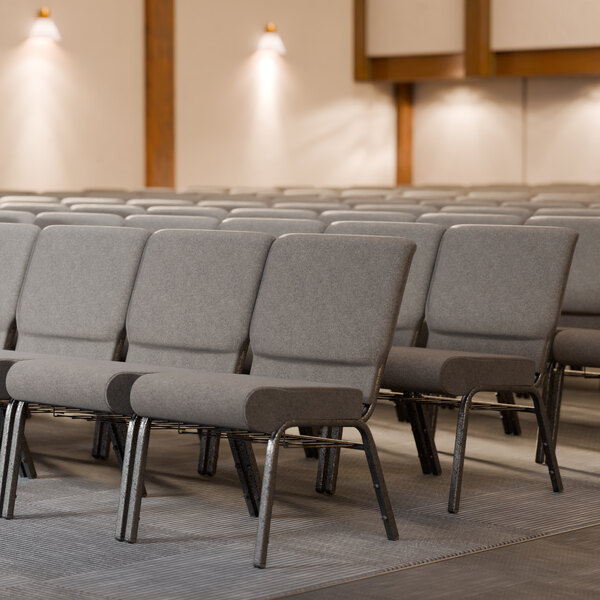 A row of Lancaster Table & Seating church chairs with gray seats.