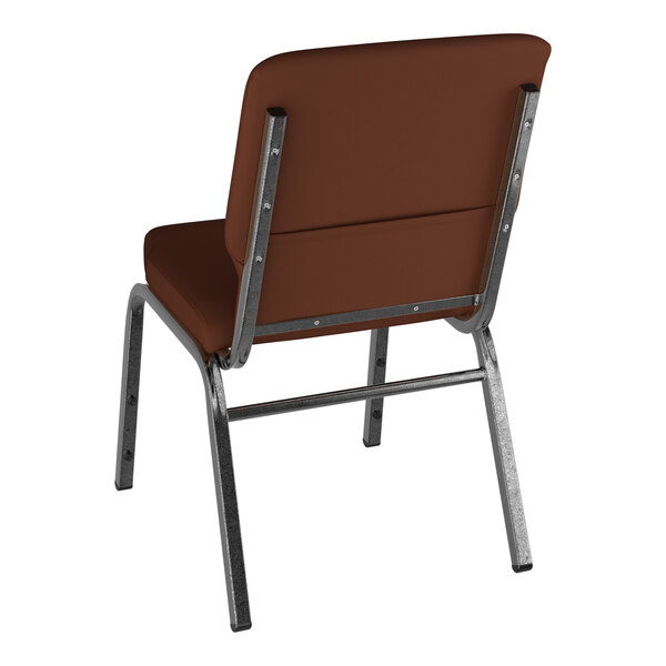 A Lancaster Table & Seating brown church chair with metal legs.