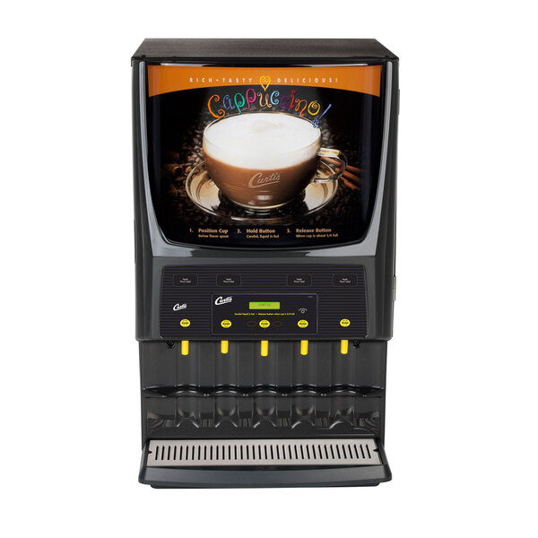 A Curtis Primo cappuccino dispenser with a cup of cappuccino on it.