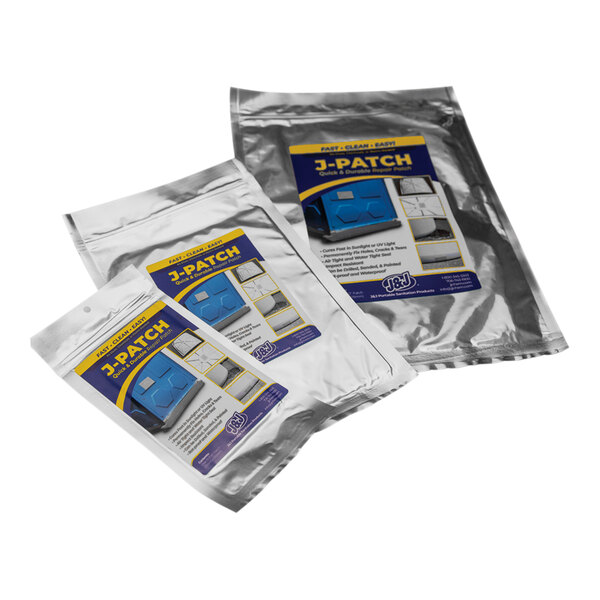 A group of silver bags with blue and yellow labels for J & J 1931474000011 9" x 12" Permanent UV-Cured Repair J-Patch.