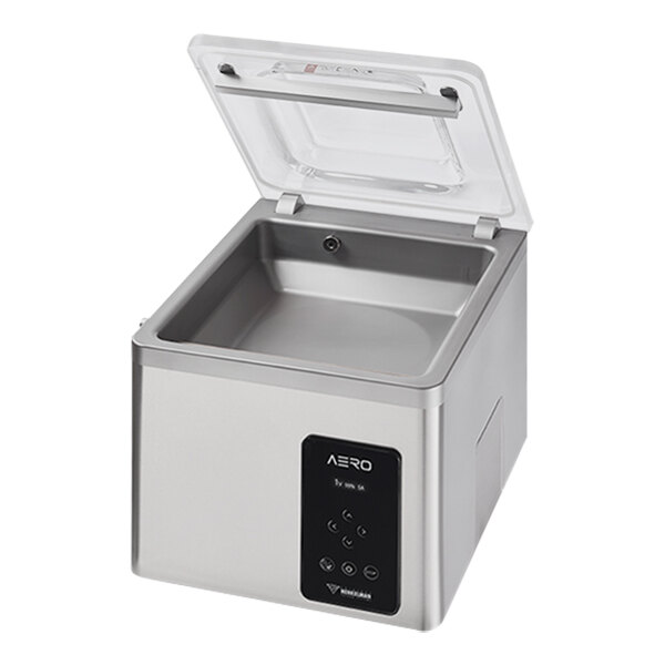 A silver and black Henkelman AERO35 chamber vacuum packaging machine on a counter.