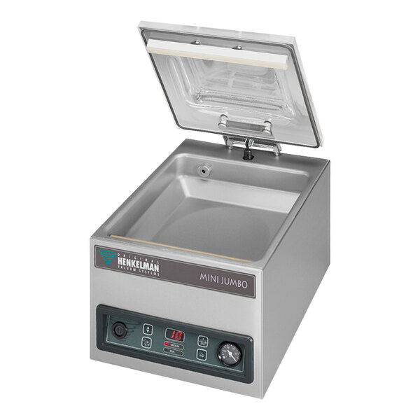 A Henkelman MINIJUMBO vacuum packaging machine with a lid open.