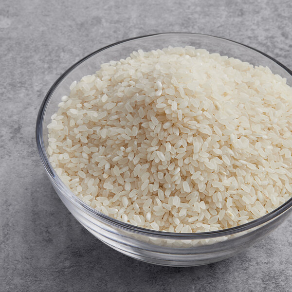 A bowl of Calrose sushi rice on a table.