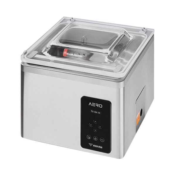 A silver and black Henkelman AERO42 chamber vacuum packaging machine on a counter.