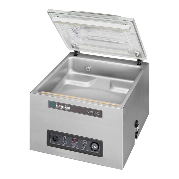 A Henkelman JUMBO42 vacuum packaging machine with the lid open.