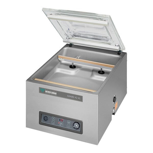 A Henkelman JUMBO42XL vacuum packaging machine with a glass lid.