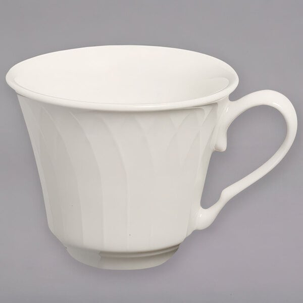 A Homer Laughlin ivory china cup with a handle.