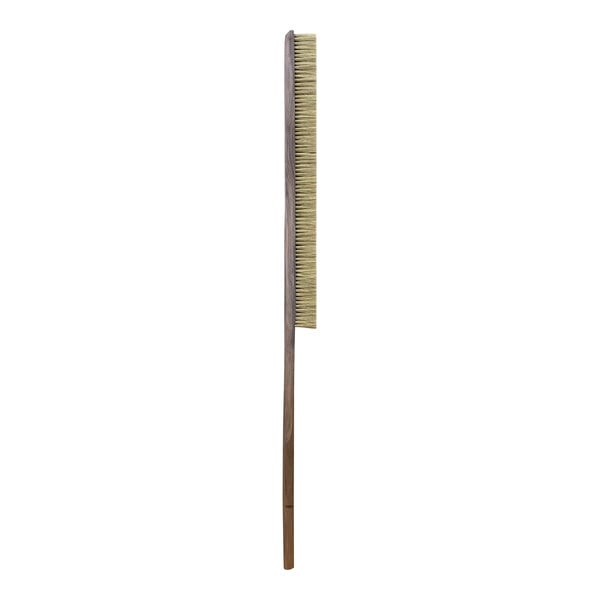 A Wood Stone natural fiber brush with a long wooden handle.