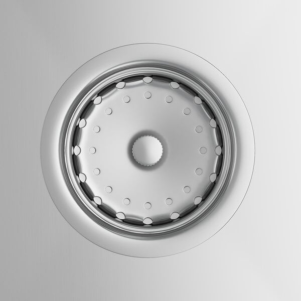 A close up of a stainless steel sink drain.