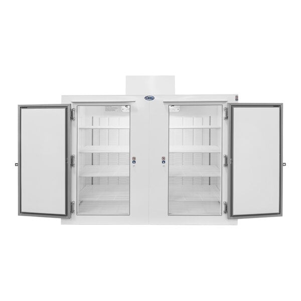 A white reach-in freezer with steel doors open.