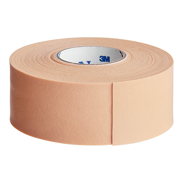 A roll of tan 3M Nexcare waterproof first aid tape.