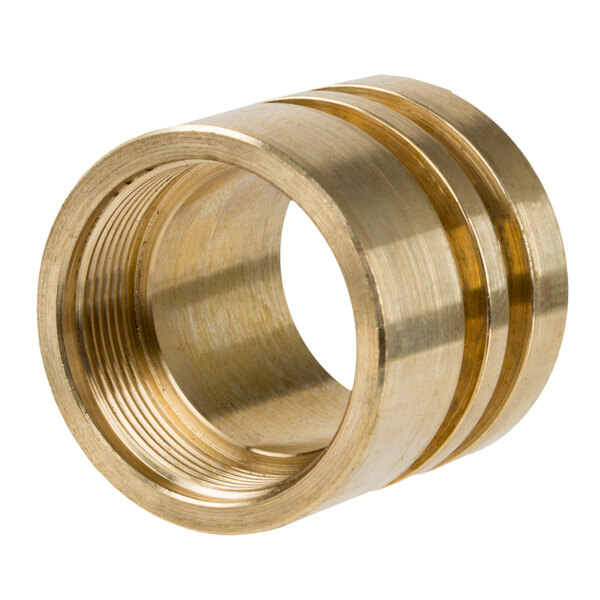 A close-up of a brass ring with a circle in the middle.