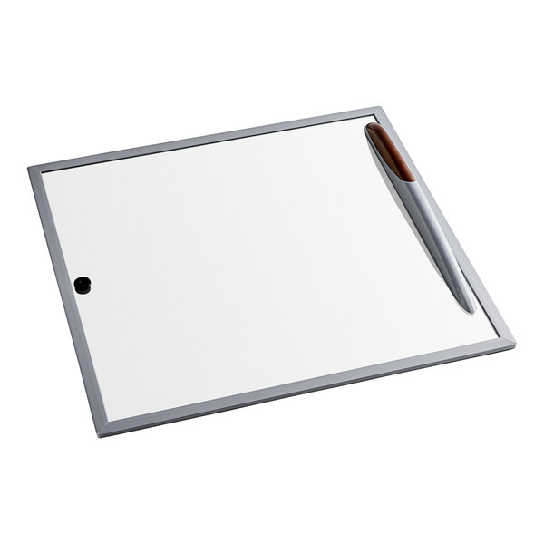 An Avantco sliding glass lid on a white board with a pen.