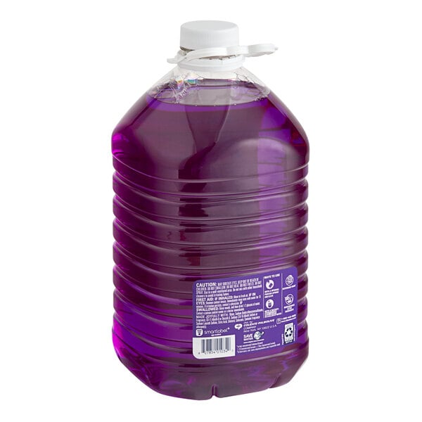 A large plastic jug of purple Fabuloso all purpose cleaner.