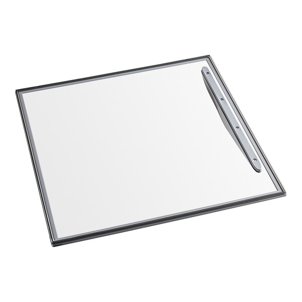 A white board with a metal handle.